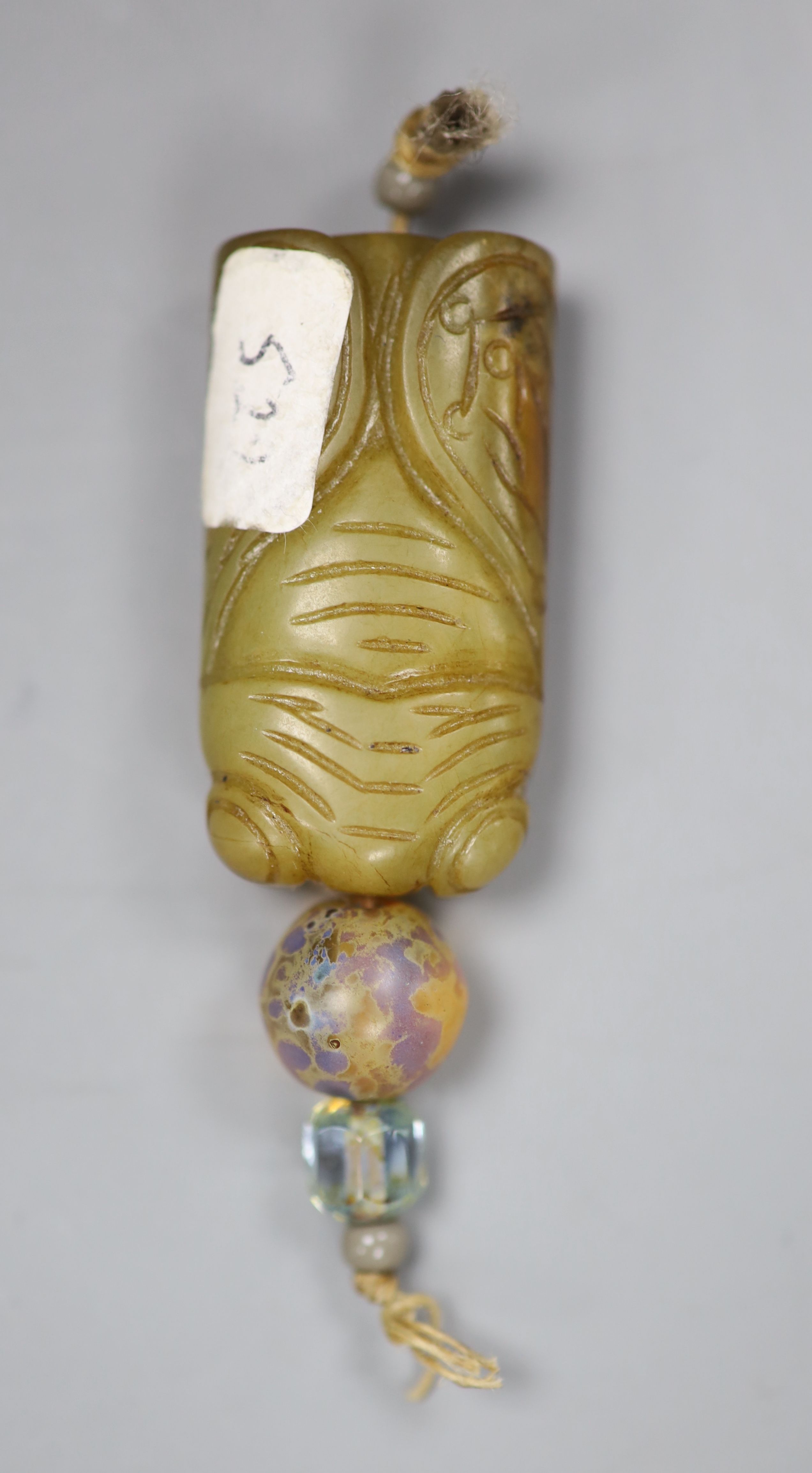 A Chinese jade cicada pendant, length 4cm